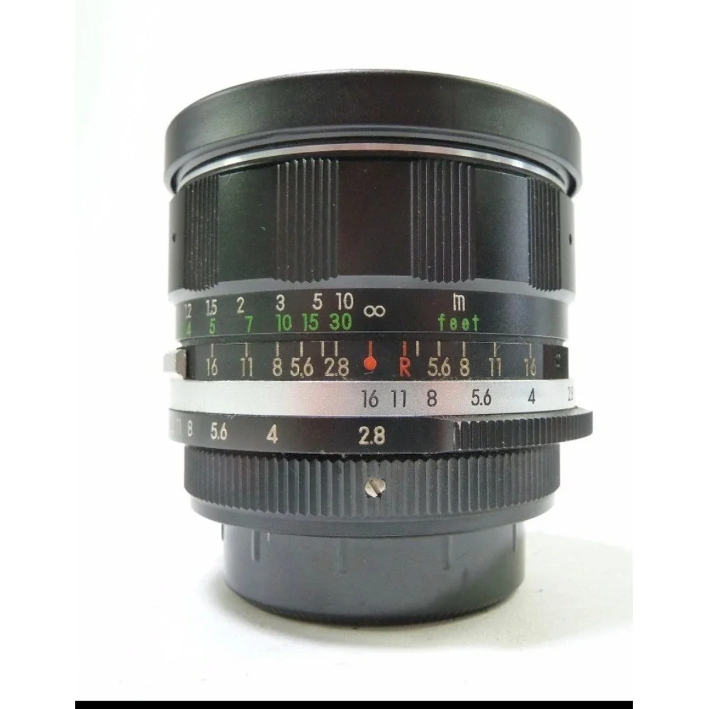 Soligor 28mm f2.8 Wide Angle Lens Japan H69902 with Braun Cap and Case
